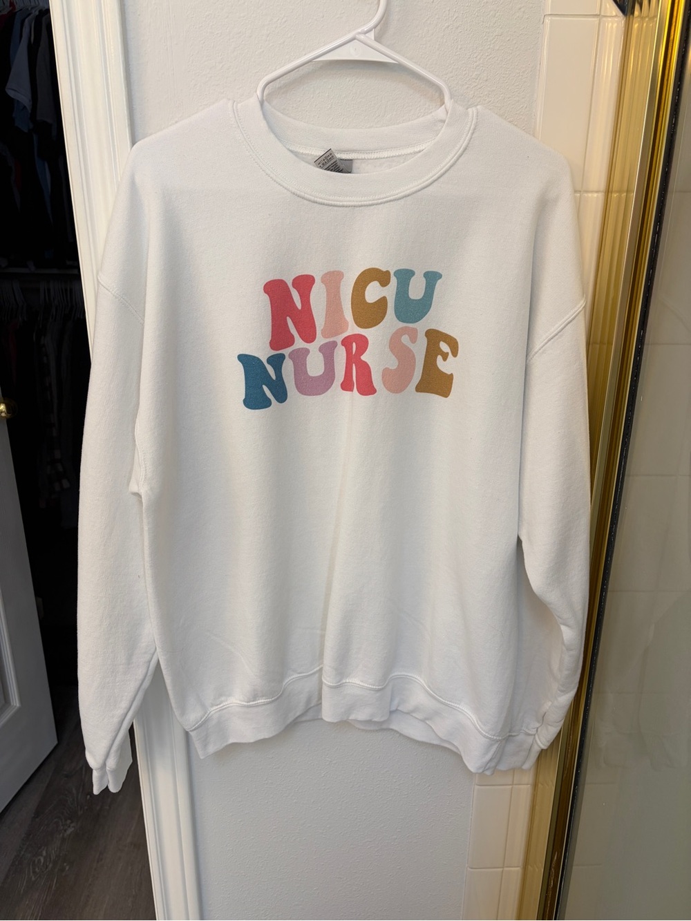 Gildan White Crewneck Sweatshirt with Multicolor 'NICU NURSE' Print